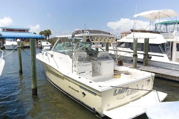 Slide: The Image of Wellcraft 330 Coastal 2004 - 1