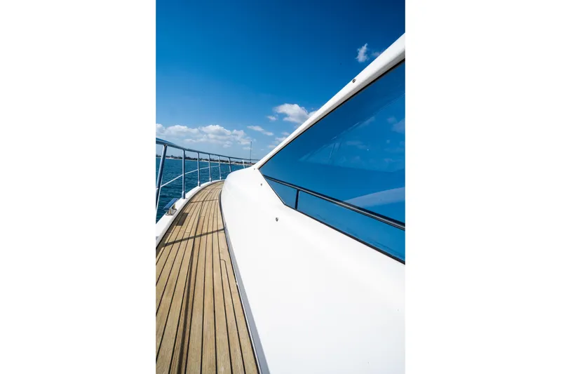 Slide: The Image of 2011 Azimut 70 yacht deck with blue sky and ocean view. - 11