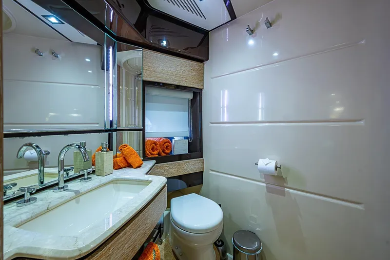 Slide: The Image of Luxurious bathroom in 2011 Azimut 70 yacht with modern fixtures and elegant design. - 15