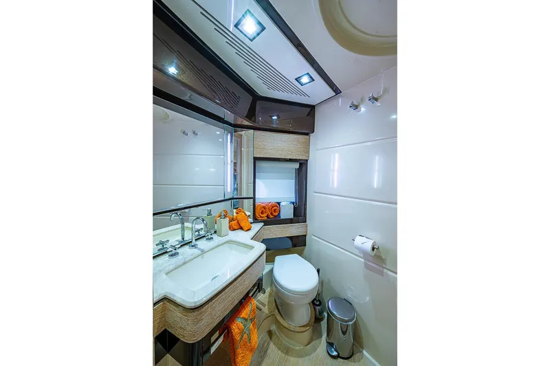Slide: The Image of Luxurious bathroom interior of 2011 Azimut 70 yacht, featuring modern fixtures and elegant design. - 16