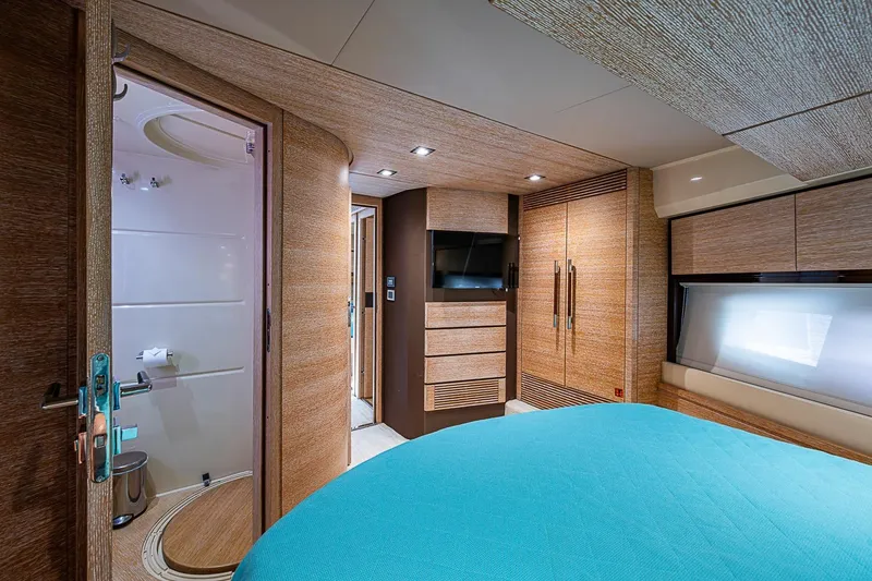 Slide: The Image of Luxurious interior of 2011 Azimut 70 yacht with modern bedroom and ensuite bathroom. - 23