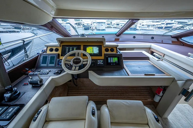 Slide: The Image of Luxurious helm of a 2011 Azimut 70 yacht with advanced navigation systems. - 34