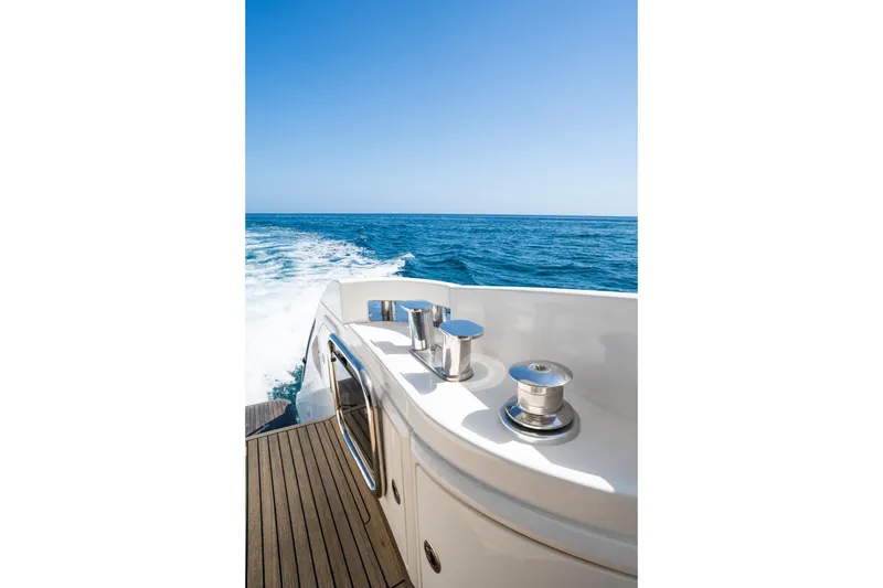 Slide: The Image of Azimut 70 yacht (2011) cruising on open sea with clear blue sky. - 8