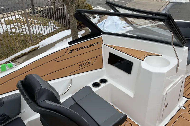 Slide: The Image of 2026 Starcraft SVX 190 OB boat interior with sleek seating and modern design. - 9