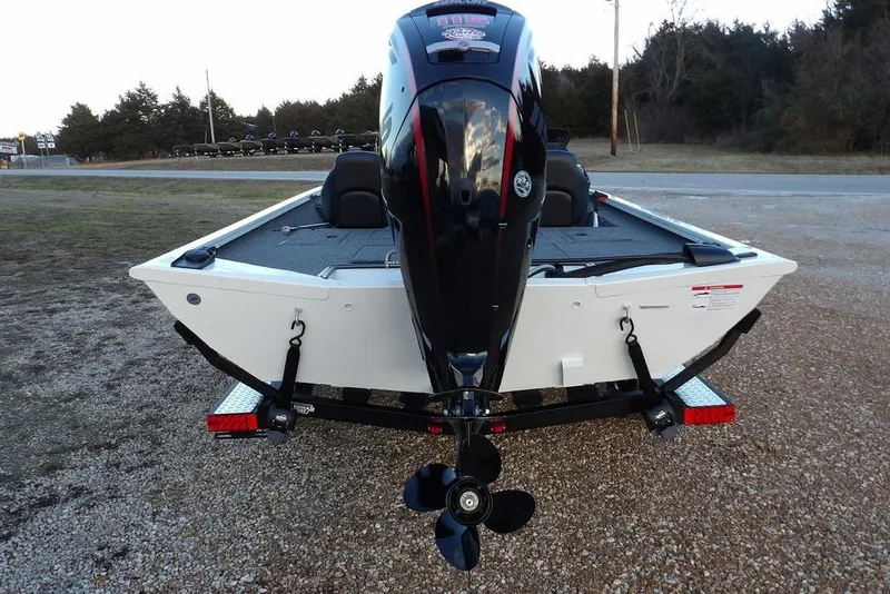 Slide: The Image of 2026 Crestliner XF 189 boat with powerful outboard motor on a trailer. - 14