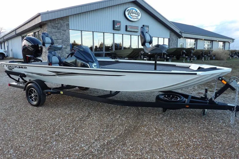 Slide: The Image of 2026 Crestliner XF 189 fishing boat on trailer outside marine center. - 15