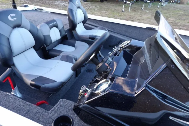 Slide: The Image of 2026 Crestliner XF 189 boat interior with dual seats and steering console. - 17