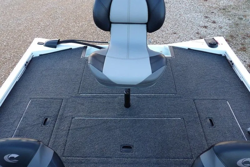 Slide: The Image of 2026 Crestliner XF 189 boat deck with a central seat and storage compartments. - 24