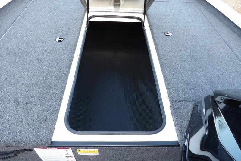 Slide: The Image of 2026 Crestliner XF 189 boat storage compartment with open hatch, showcasing spacious interior. - 36