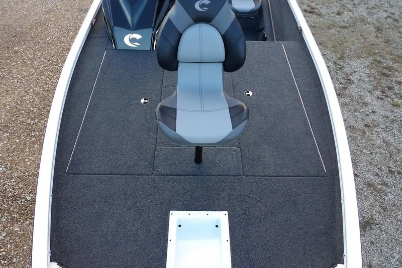 Slide: The Image of 2026 Crestliner XF 189 boat interior with gray seating and carpeted deck. - 40