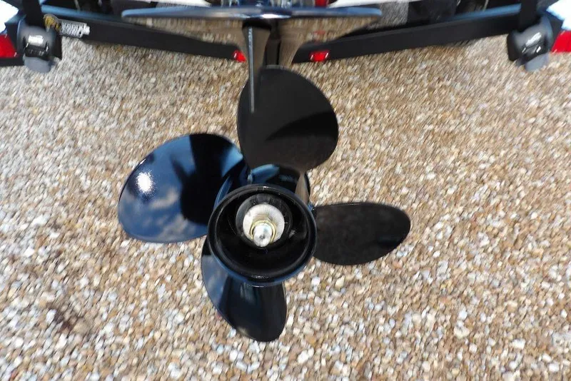 Slide: The Image of Propeller of 2026 Crestliner XF 189 boat on gravel surface. - 41