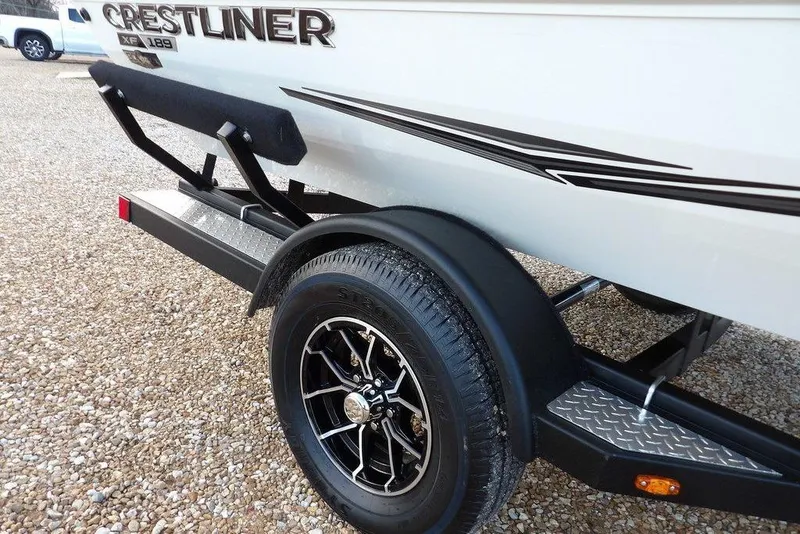 Slide: The Image of 2026 Crestliner XF 189 boat trailer with sleek design and durable wheels. - 45