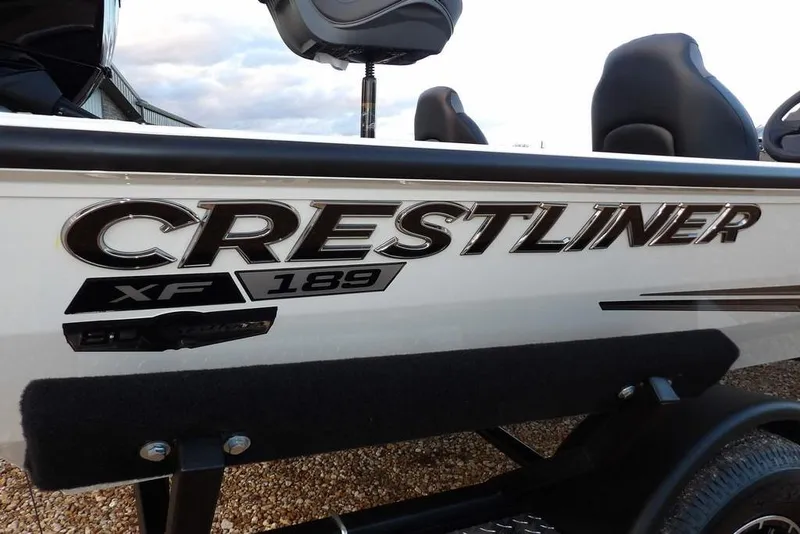 Slide: The Image of 2026 Crestliner XF 189 boat side view with logo and seating. - 47