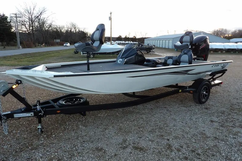 Slide: The Image of 2026 Crestliner XF 189 fishing boat on trailer, parked outdoors. - 5