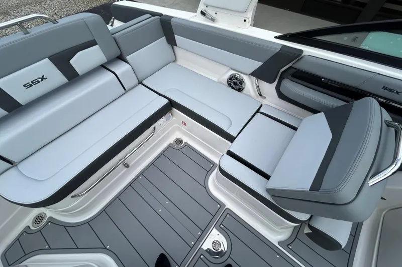 Slide: The Image of 2026 Chaparral SSX 4 boat interior with sleek gray seating and modern design. - 10