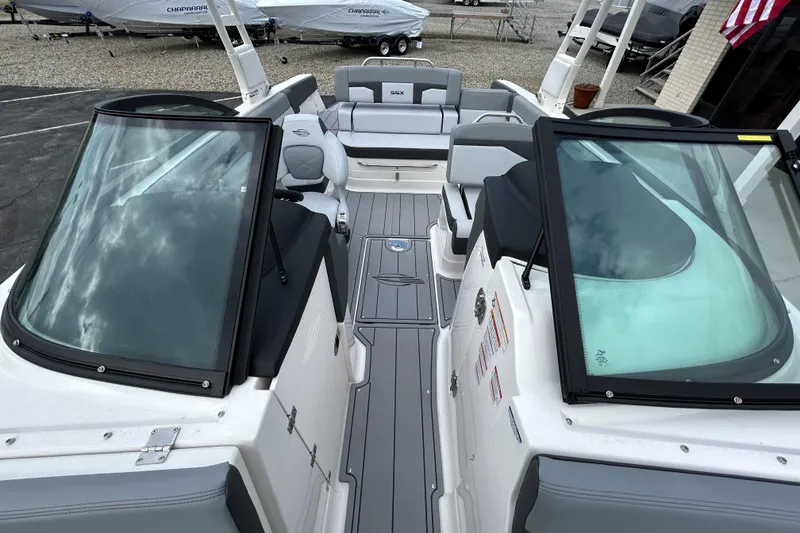 Slide: The Image of 2026 Chaparral SSX 4 boat interior with sleek seating and modern design. - 18