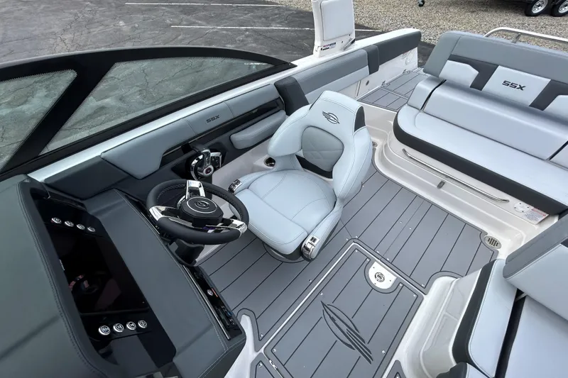 Slide: The Image of 2026 Chaparral SSX 4 boat interior with sleek seating and modern dashboard design. - 20