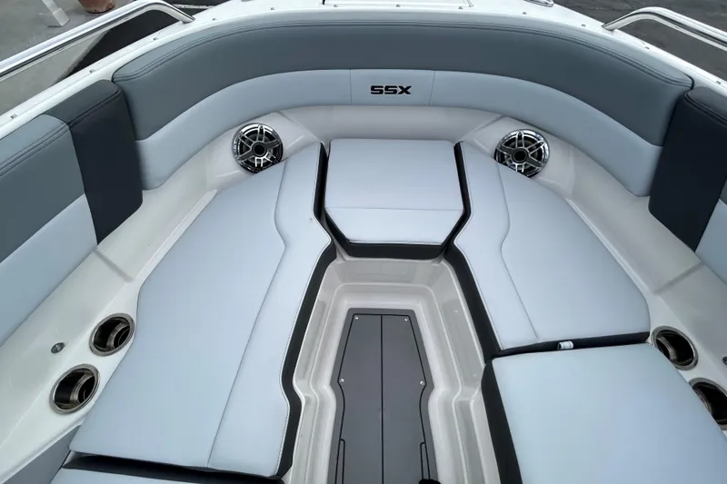 Slide: The Image of 2026 Chaparral SSX 4 boat interior with sleek seating and modern design. - 7