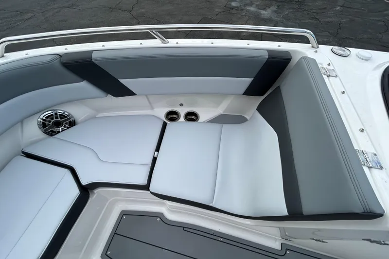 Slide: The Image of 2026 Chaparral SSX 4 boat interior with sleek gray seating and modern design. - 8