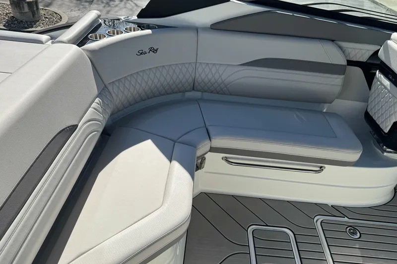 Slide: The Image of Luxurious seating on 2026 Sea Ray SLX 260 boat with elegant design and cup holders. - 21