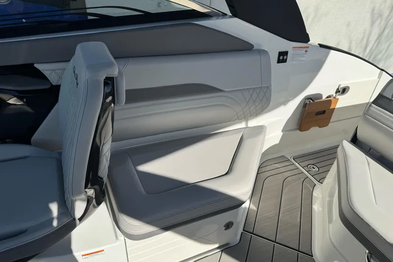 Slide: The Image of Interior of 2026 Sea Ray SLX 260 boat, featuring sleek seating and modern design. - 22
