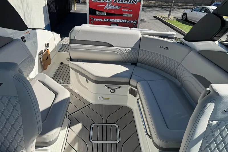 Slide: The Image of 2026 Sea Ray SLX 260 boat interior with luxurious seating and modern design. - 25