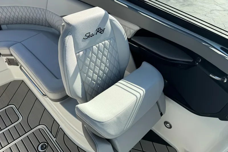 Slide: The Image of 2026 Sea Ray SLX 260 boat interior with luxurious seating and elegant design. - 29
