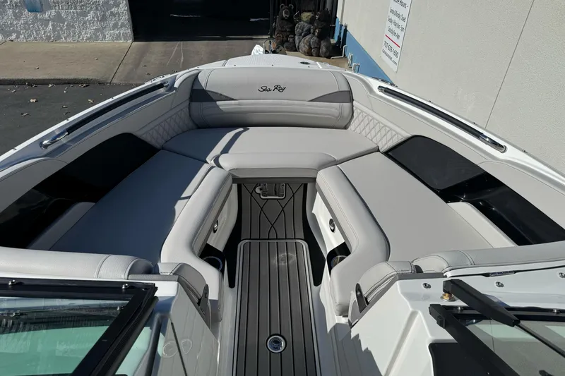 Slide: The Image of 2026 Sea Ray SLX 260 boat interior with luxurious seating and sleek design. - 41