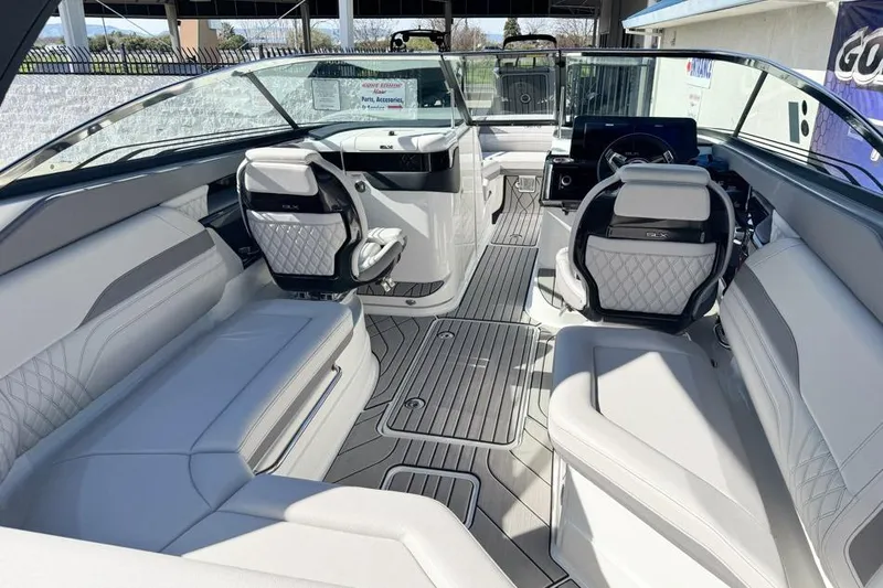 Slide: The Image of Luxurious interior of 2026 Sea Ray SLX 260 boat with modern seating and sleek design. - 16