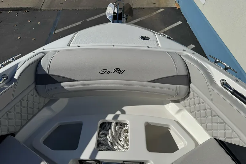 Slide: The Image of 2026 Sea Ray SLX 260 boat interior with elegant seating and storage area. - 47