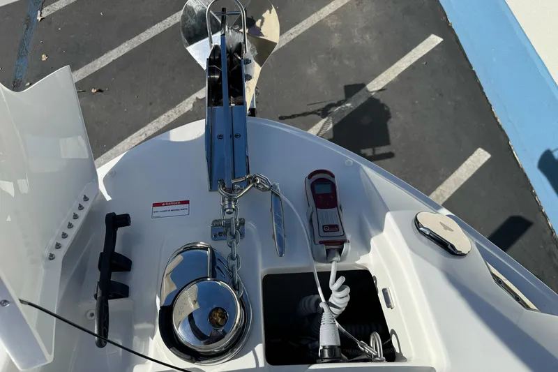 Slide: The Image of 2026 Sea Ray SLX 260 boat anchor system with chrome details and control panel. - 48