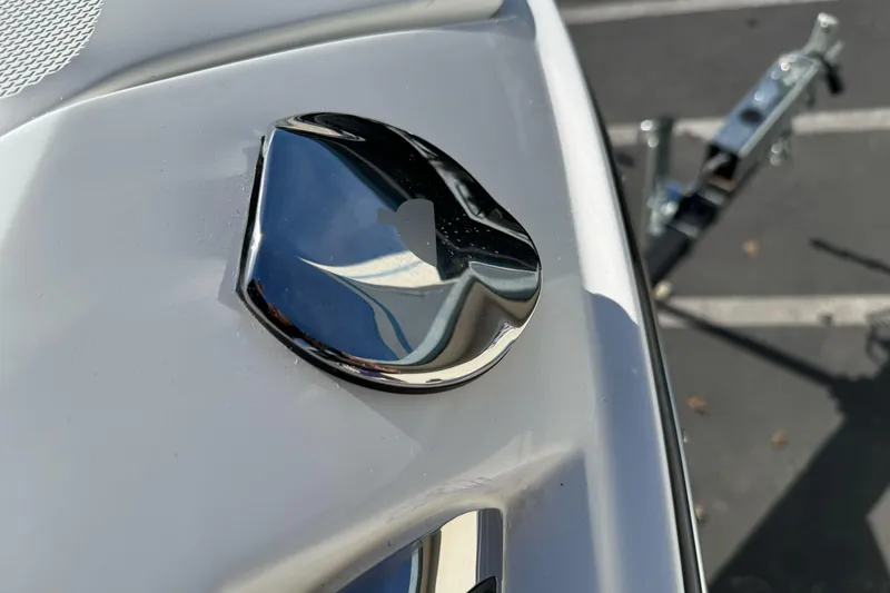 Slide: The Image of 2026 Sea Ray SLX 260 boat emblem on a sleek white surface. - 49