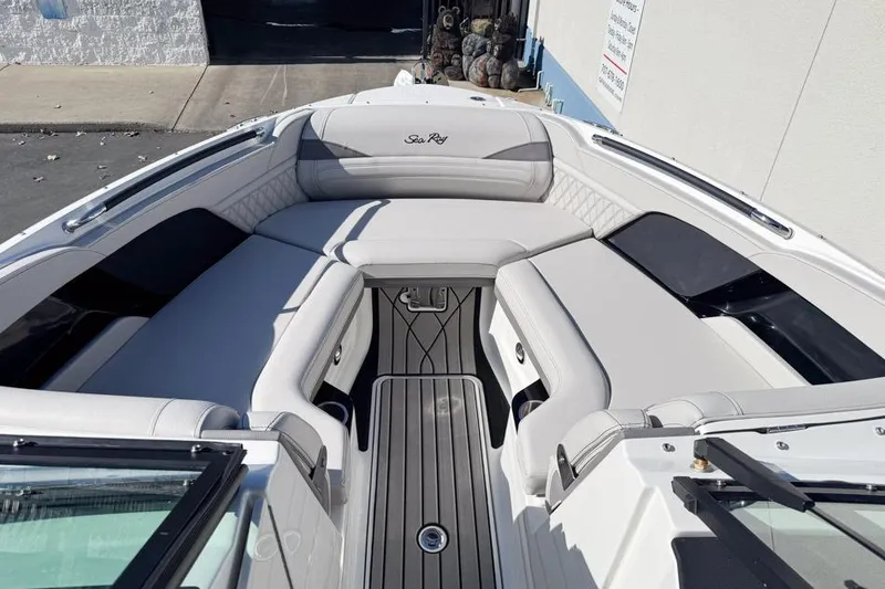 Slide: The Image of 2026 Sea Ray SLX 260 boat interior with luxurious seating and sleek design. - 35