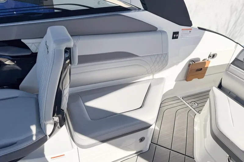 Slide: The Image of Interior view of 2026 Sea Ray SLX 260 boat, featuring luxurious seating and modern design. - 17