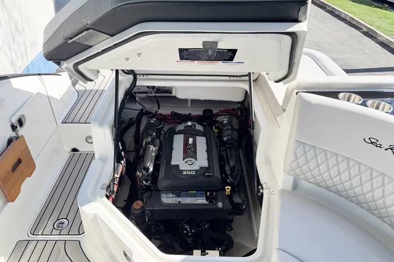 Slide: The Image of Engine compartment of 2026 Sea Ray SLX 260 boat, showcasing a powerful 350 engine. - 46