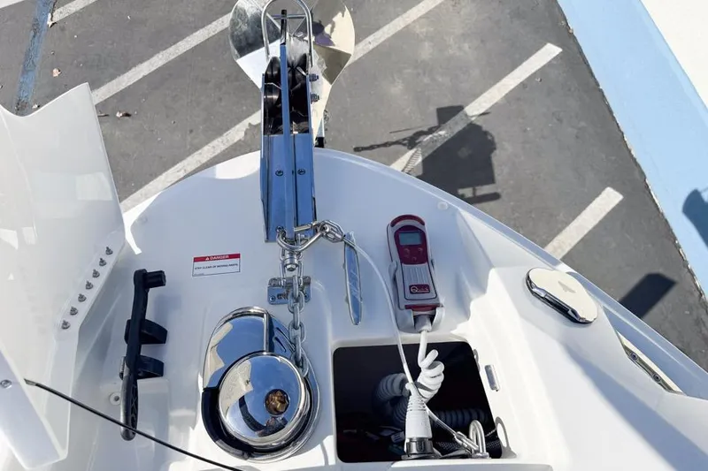 Slide: The Image of Bow view of 2026 Sea Ray SLX 260 with anchor and control panel. - 41