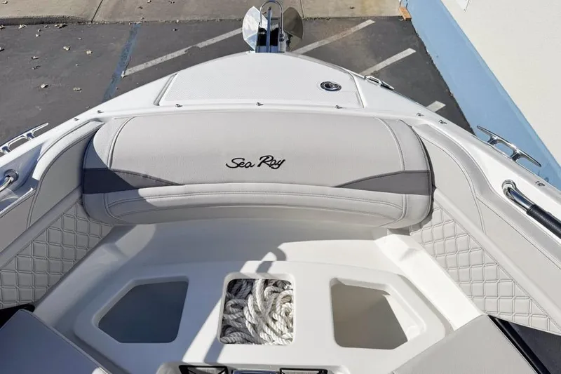 Slide: The Image of 2026 Sea Ray SLX 260 boat interior with elegant seating and storage compartment. - 40