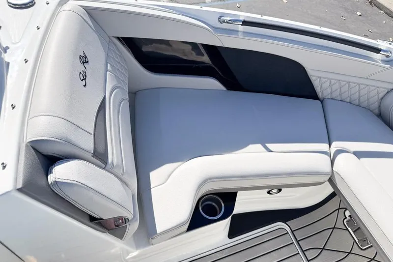 Slide: The Image of Luxurious seating on 2026 Sea Ray SLX 260 boat, featuring elegant white upholstery. - 36