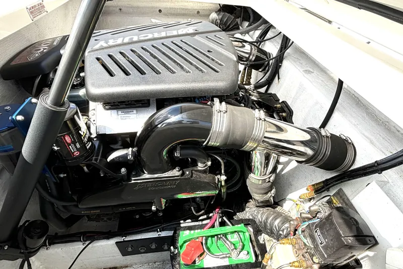Slide: The Image of Engine compartment of a 2005 Fountain 27 Fever boat with Mercury components. - 16