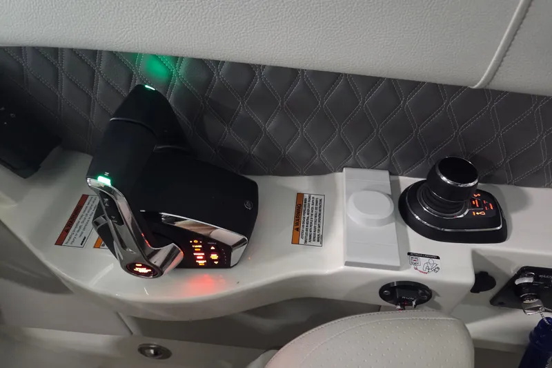 Slide: The Image of Dashboard display of 2023 Sea Ray SLX 350 showing engine hours and maintenance status. - 11