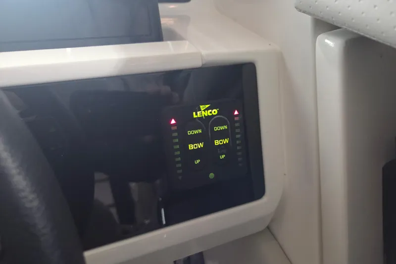 Slide: The Image of 2023 Sea Ray SLX 350 boat interior with luxurious seating and modern speakers. - 17