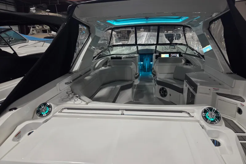 Slide: The Image of 2023 Sea Ray SLX 350 boat interior with sleek seating and modern amenities. - 18