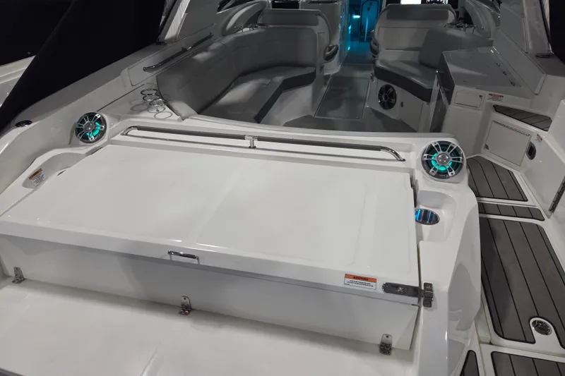 Slide: The Image of 2023 Sea Ray SLX 350 boat interior with luxurious seating and modern amenities. - 20