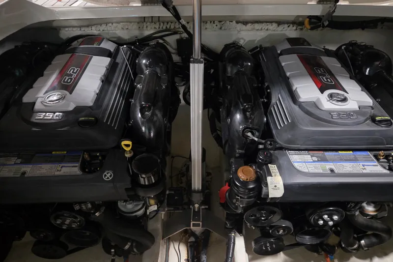 Slide: The Image of 2023 Sea Ray SLX 350 boat propellers in a garage setting. - 29