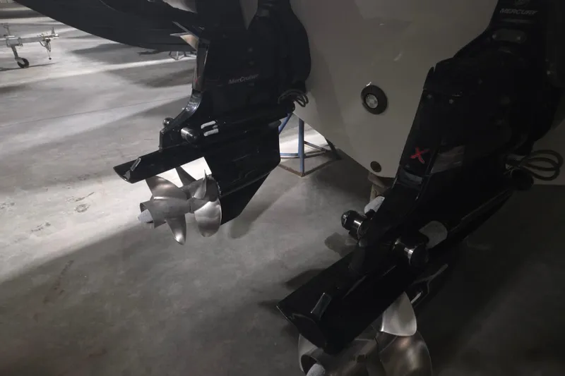 Slide: The Image of 2023 Sea Ray SLX 350 interior with gray seating and built-in speaker. - 31