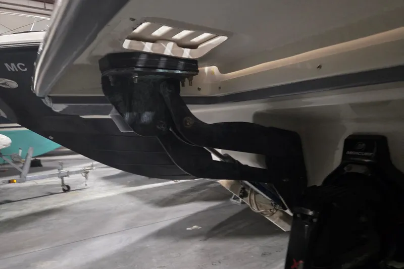 Slide: The Image of 2023 Sea Ray SLX 350 interior with luxurious seating and modern dashboard. - 32