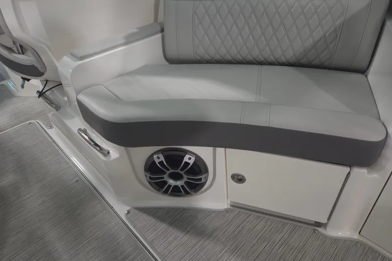 Slide: The Image of 2023 Sea Ray SLX 350 boat interior with seating and speaker system. - 33