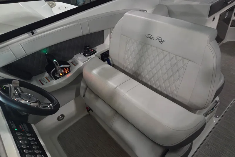 Slide: The Image of 2023 Sea Ray SLX 350 interior seating with elegant diamond stitching and premium materials. - 36