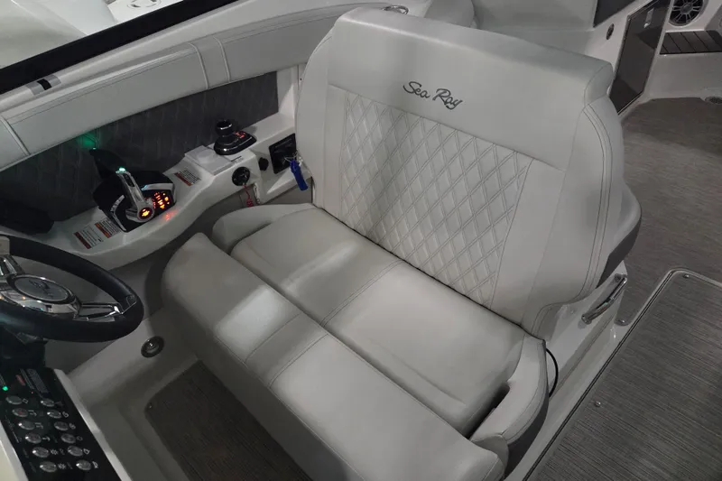 Slide: The Image of 2023 Sea Ray SLX 350 interior with luxurious seating and elegant design. - 37