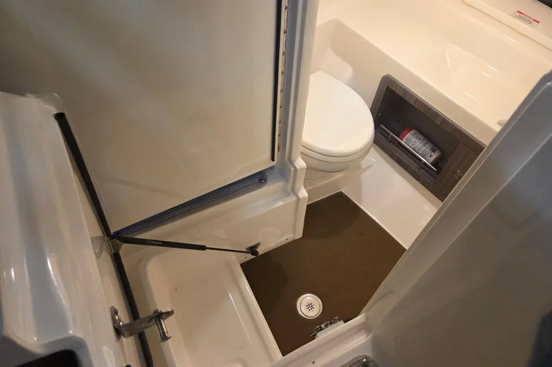 Slide: The Image of 2023 Sea Ray SLX 350 interior detail, featuring sleek white surfaces and modern design elements. - 48